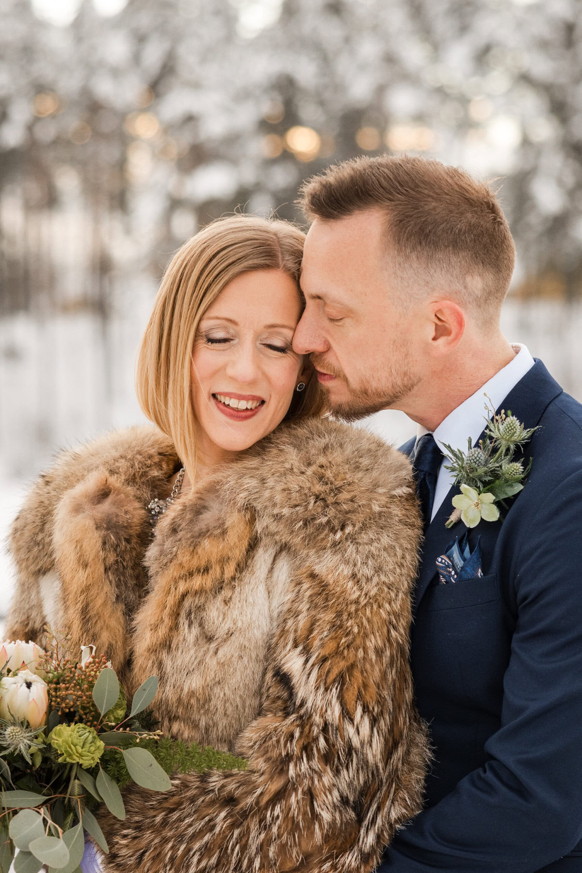 Couple in winter wedding attire.