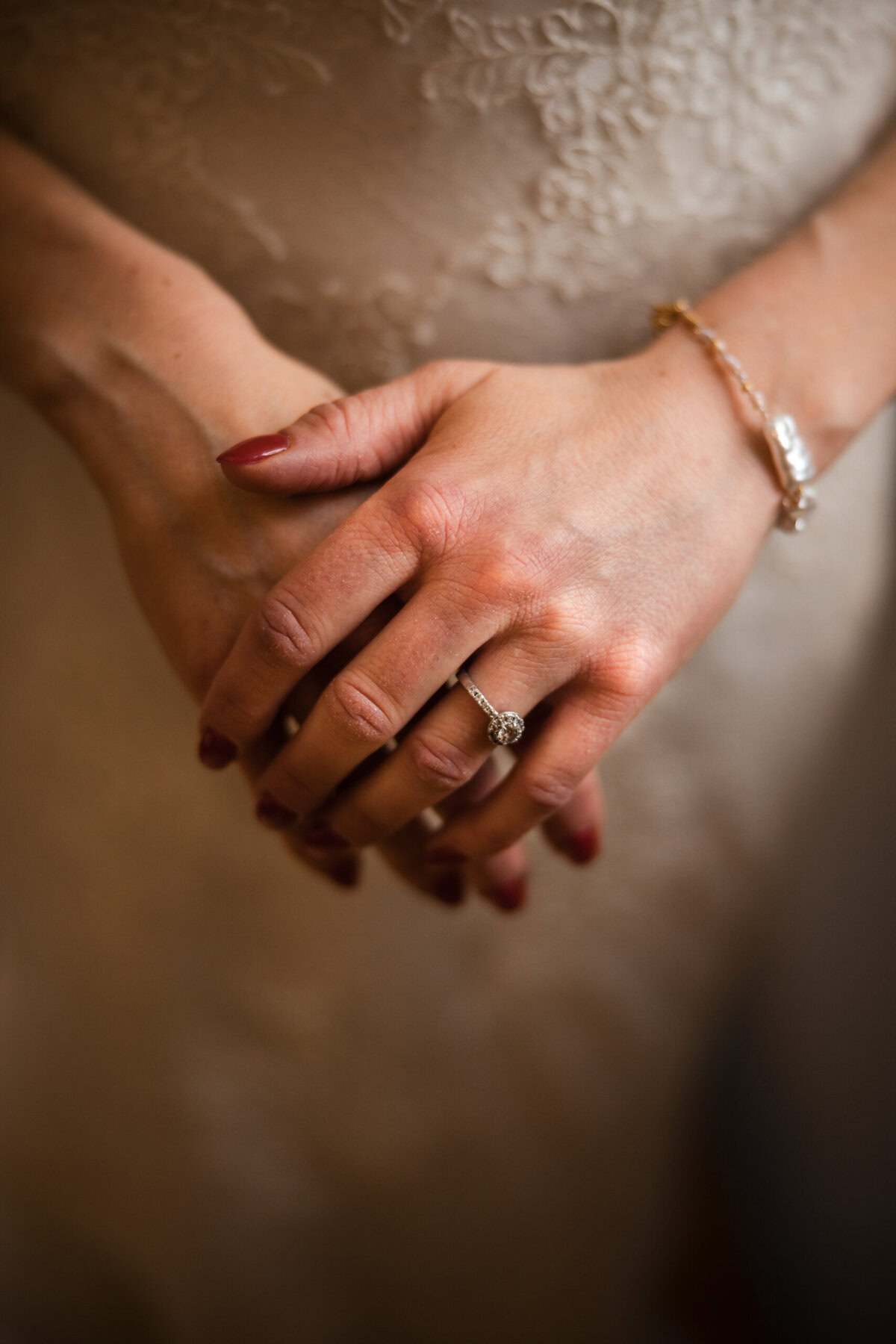 Elegant hands with jewelry and ring