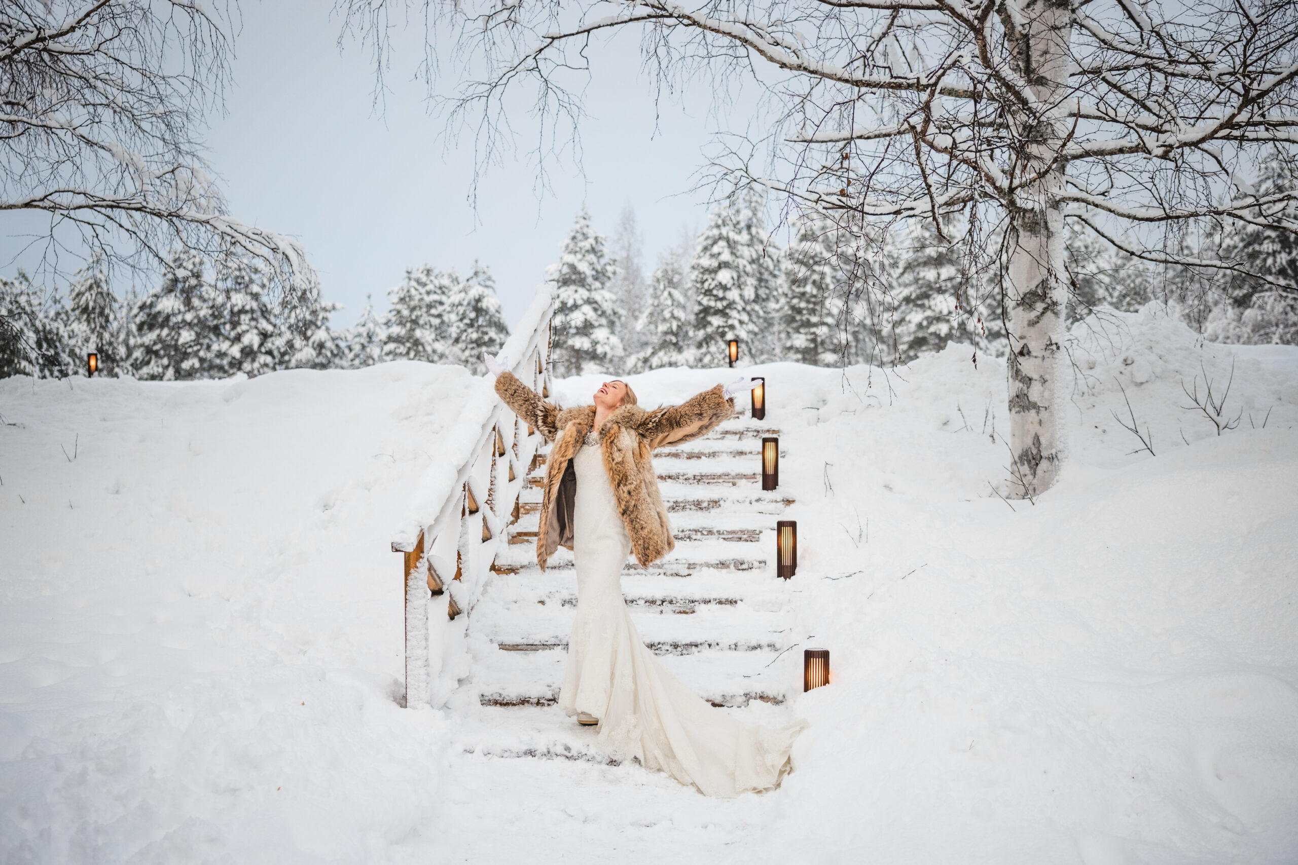 Bride in the snow at Sörbyn Lodge